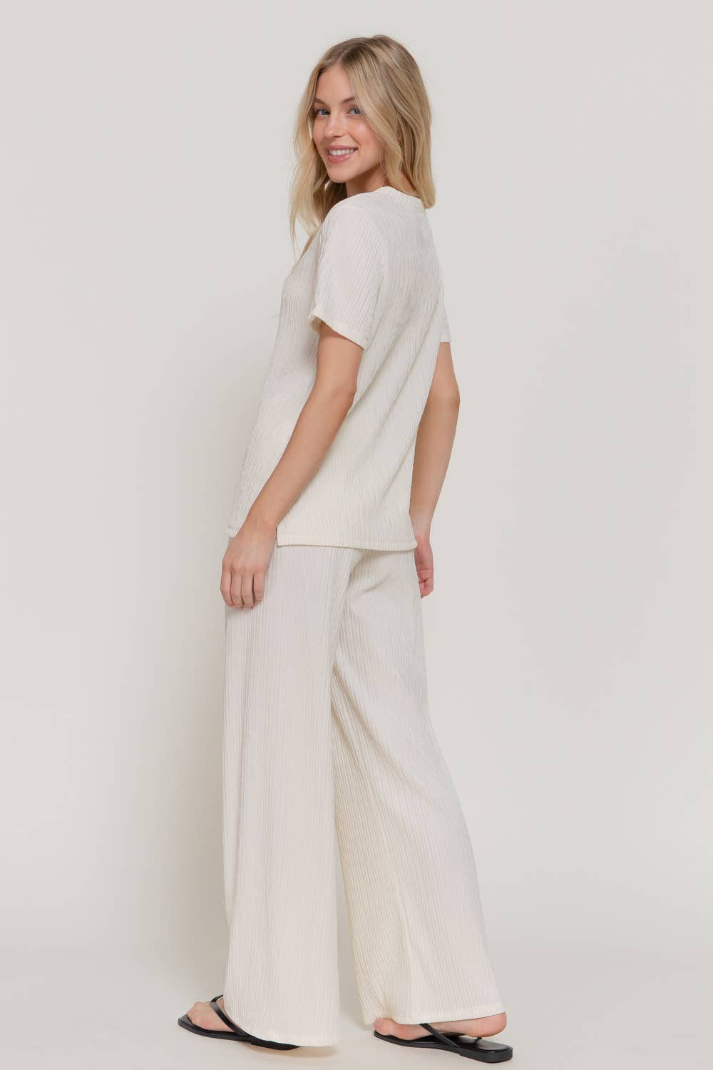Active USA - Conjunto de top de manga corta y pantalón de punto ancho para mujer - SET14970